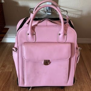 New with minor scuffs Mcklein wheeled detachable laptops bag in pink leather